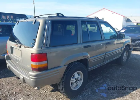 1997 Jeep Grand Cherokee Limited z USA, uszkodzony, nr VIN 1J4GZ78Y5VC613495